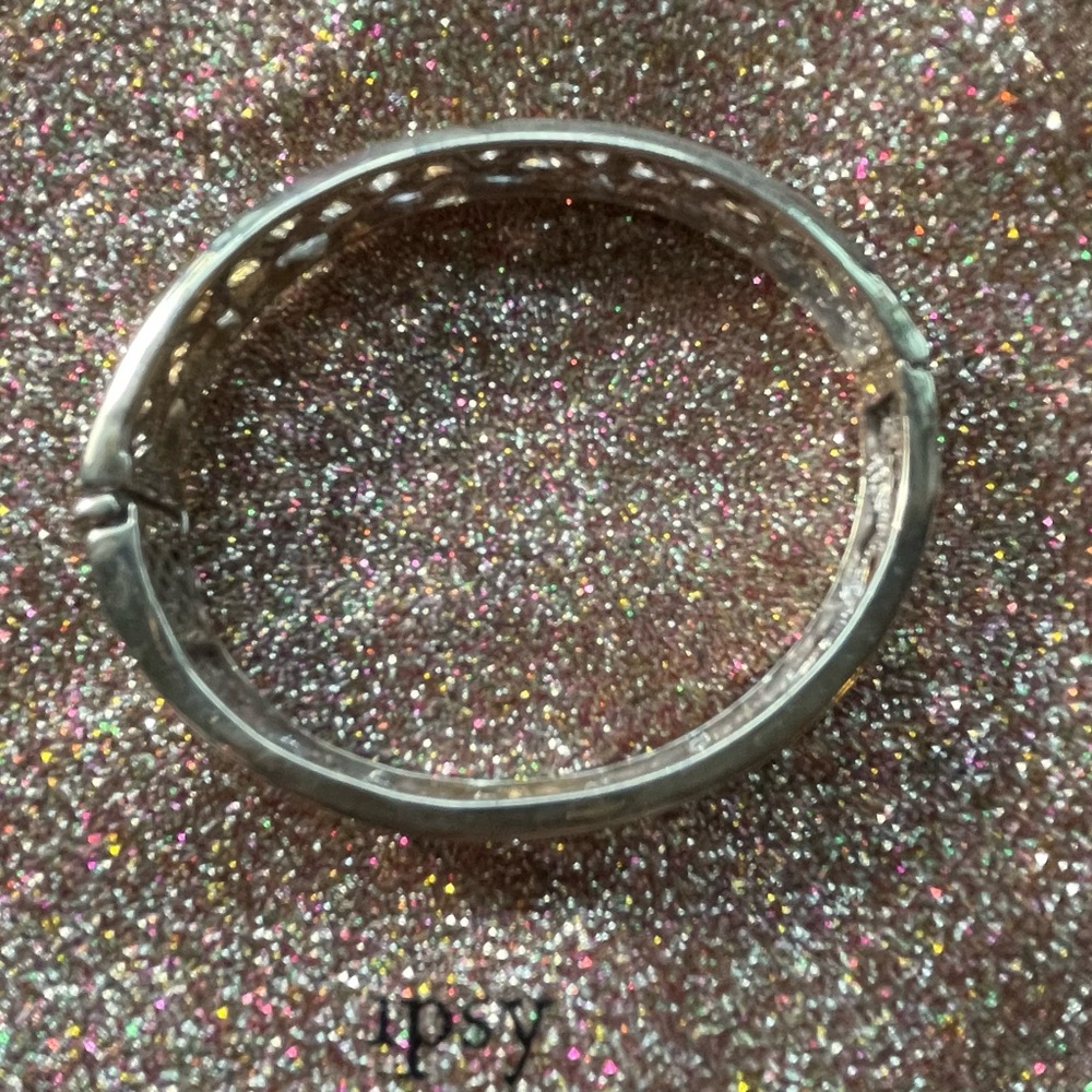 Silver (925), gold, and rose gold bracelet.